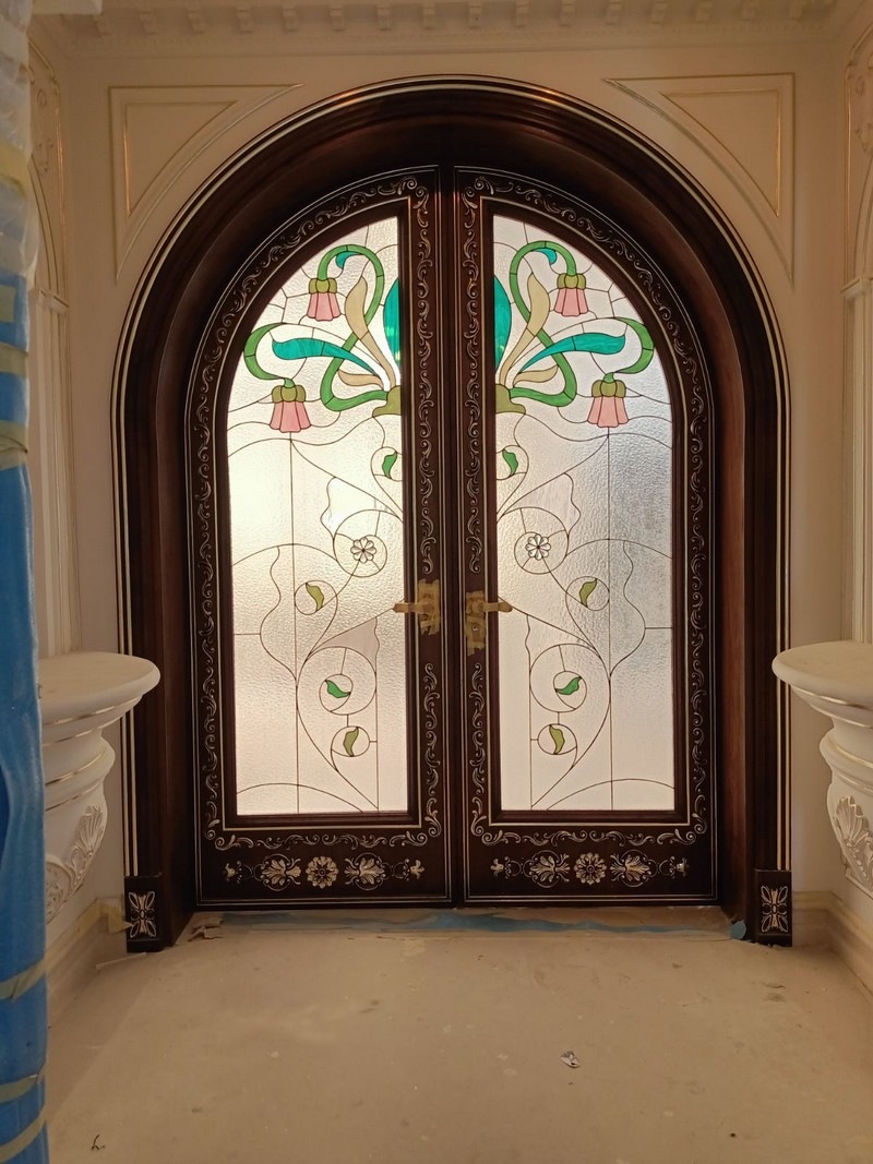 Stained glass windows in the door